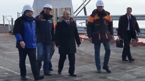 بوتين يزور جسر القرم لأول مرة بعد قصفه